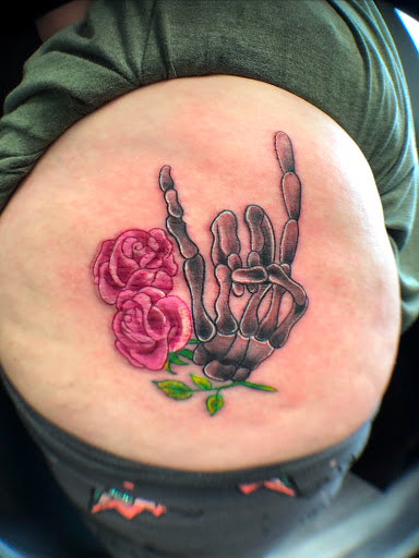 Explore simple silver lining tattoo ideas, creative tattoo ideas in Greenfield, available at Tattoos In Time Studio