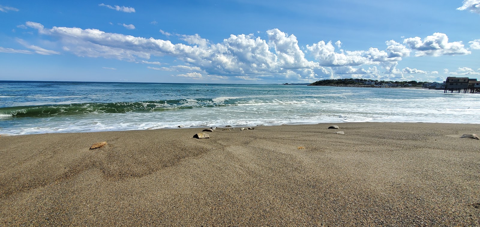 Foto von Peggotty beach mit lange, gerade küste