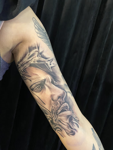 Explore disney sleeve tattoo ideas, creative tattoo ideas in Richland, available at The Green Room Tattoo Lounge