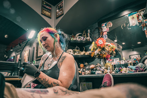 Explore calf tattoo ideas for women, creative tattoo ideas in Cincinnati, available at Red Dragon Tattoo & Piercing