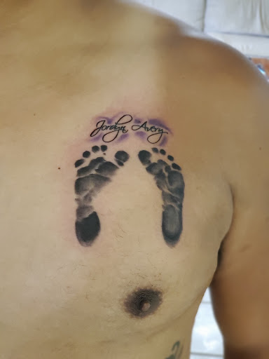 Explore sternum tattoo ideas for females, creative tattoo ideas in Stamford, available at KE Tattoo Studio