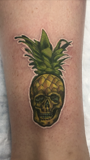 Find small tattoo between breast ideas for your next unique tattoo in Garden Grove at Ashes 2 Ink Tattoo and Piercing LLC