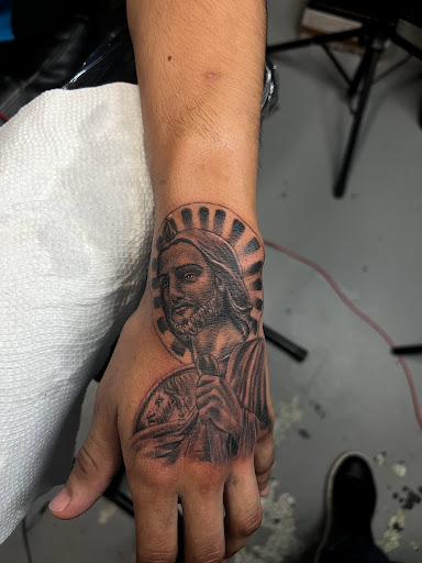 Explore st christopher tattoo ideas, creative tattoo ideas in Mcallen, available at House of Tattoos