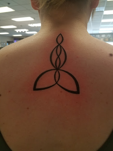 Explore mother son matching tattoo ideas, creative tattoo ideas in Fargo, available at Dead RockStar Tattoos, Body Piercing