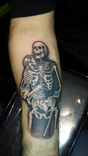 Tattoo Shop «Tit 4 Tat Tattoo Studio Inc.», reviews and photos, 45571 Mound Rd, Shelby Charter Township, MI 48317, USA