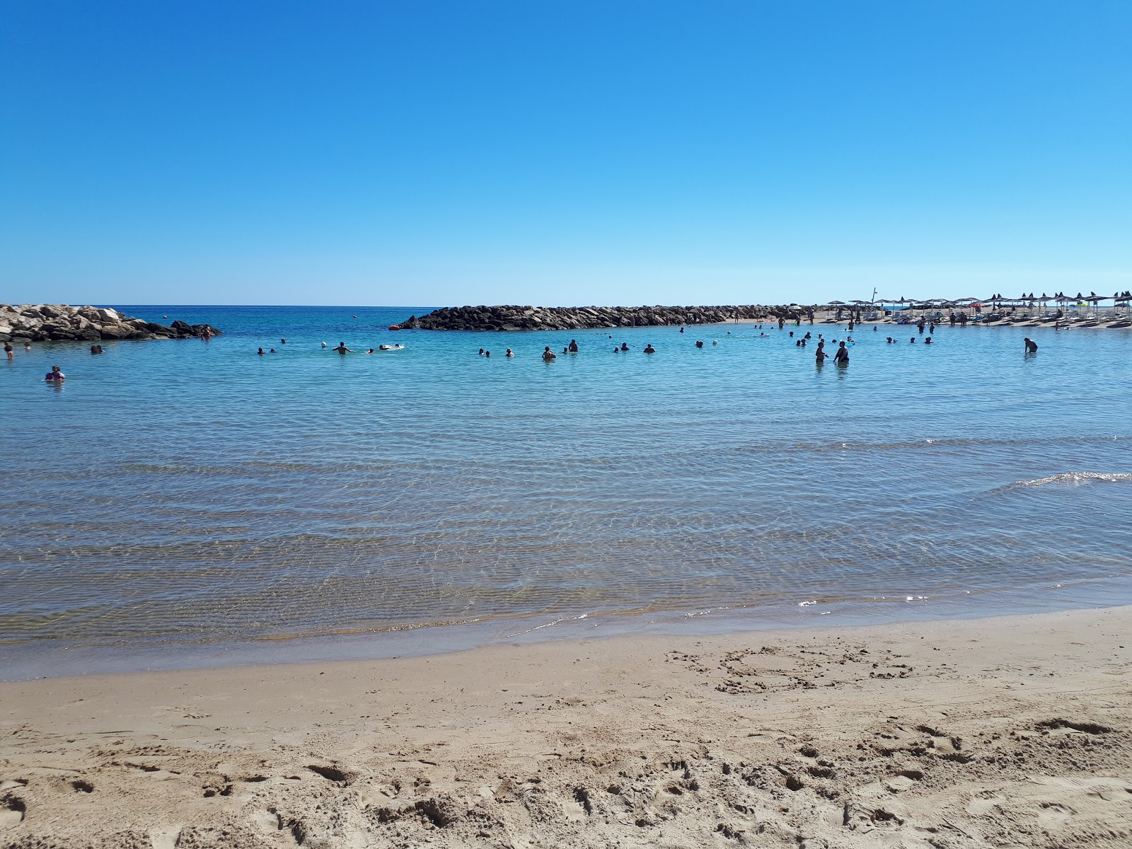 Foto von Spiaggia Campo di Mare mit viele lange buchten
