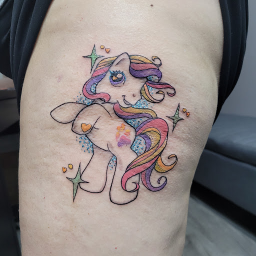 Explore female back tattoo ideas, creative tattoo ideas in Utica, available at No Name Tattoo Downtown Utica