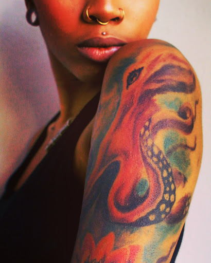 Find under the breast tattoo ideas for your next unique tattoo in Atlanta at Iron Palm Tattoos & Body Piercing Atlanta