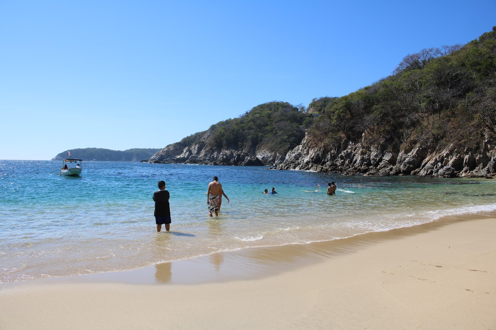 Foto av Playa Violin med beige sand yta