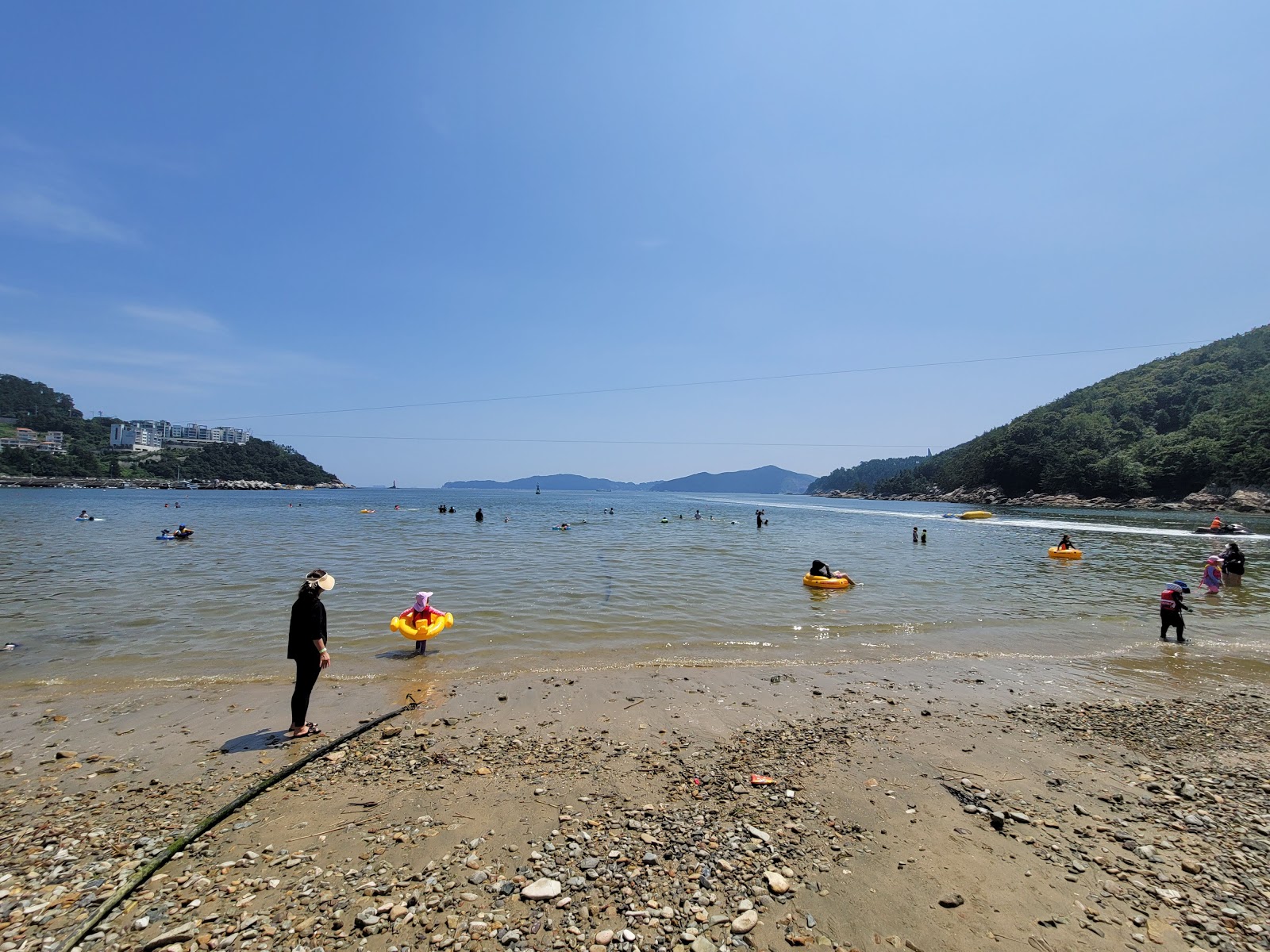 Deokpo Beach'in fotoğrafı çok temiz temizlik seviyesi ile
