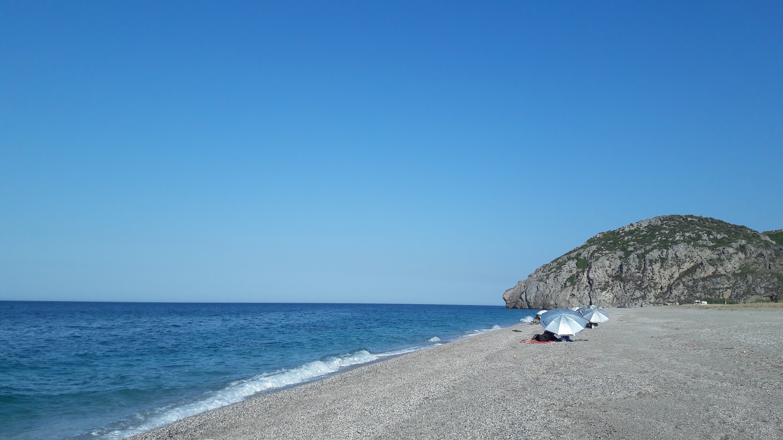 Foto von Murteris beach und die siedlung