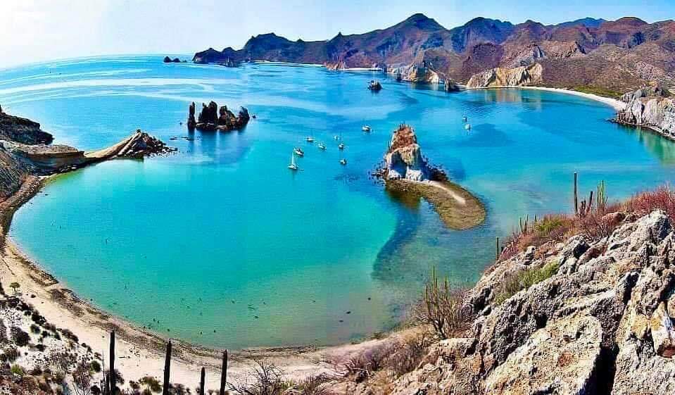 Foto de Playa Punta San Basilio con arena beige superficie