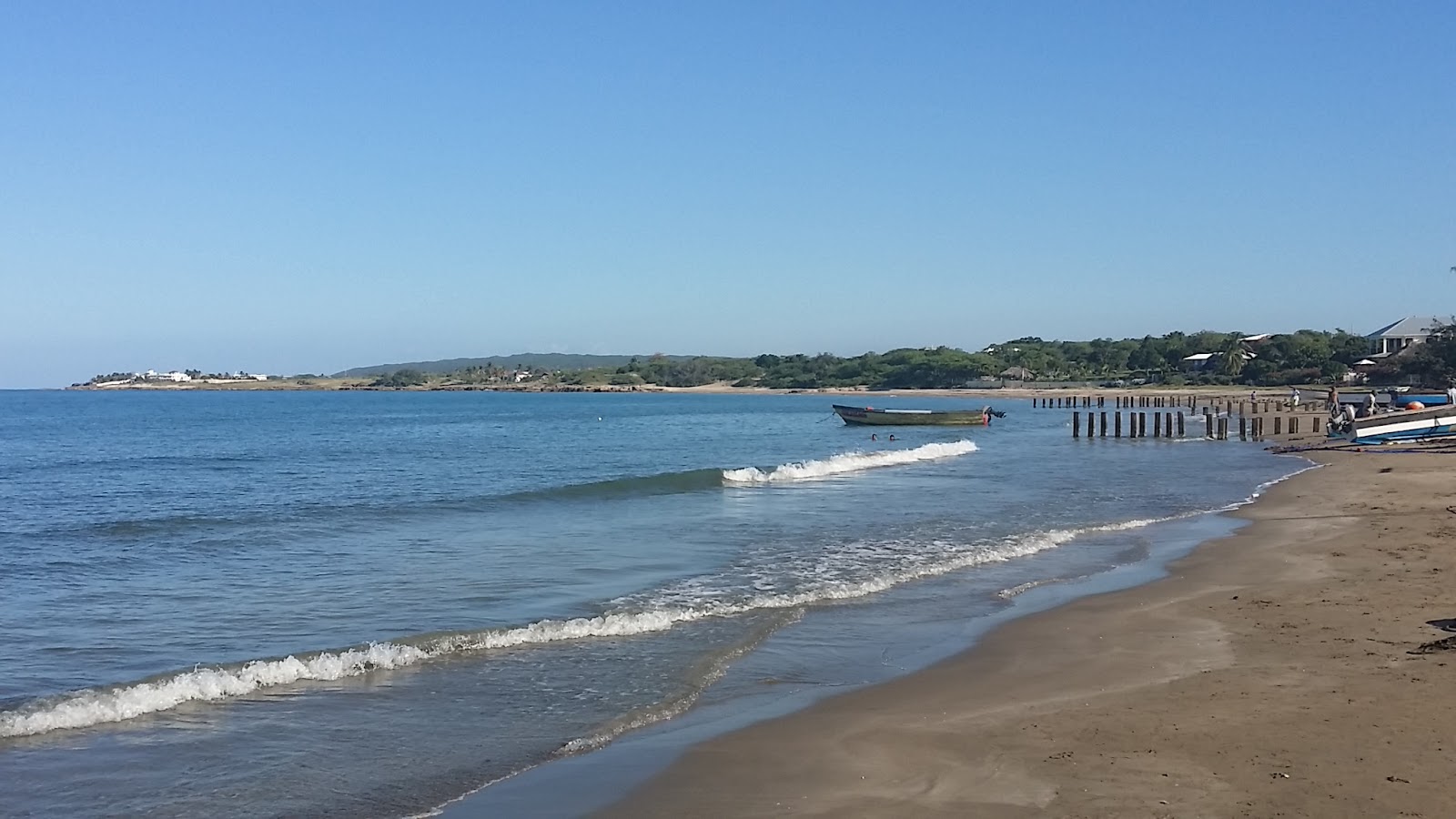 Zdjęcie Treasure Beach z powierzchnią beżowy piasek