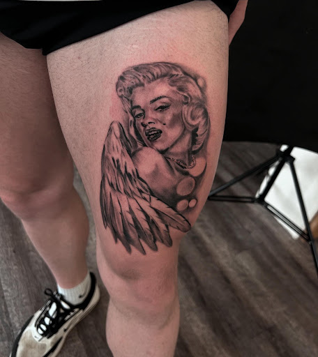 Explore country music tattoos ideas, creative tattoo ideas in Marietta, available at Monkeys Uncle Tattoo