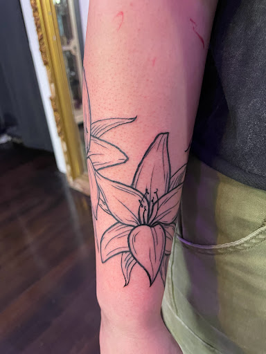 Explore beartooth tattoo ideas, creative tattoo ideas in Logan, available at Surreal Ink Tattoo & Body Piercing