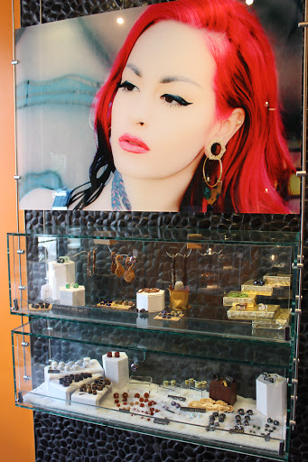 Explore abstract tattoos ideas, creative tattoo ideas in Denver, available at IRIS Piercing Studio and Jewelry Gallery