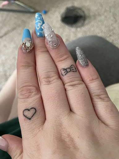 Explore family tattoo ideas for females, creative tattoo ideas in Rome, available at Artistic Edge Tattoo