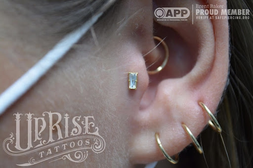 Explore men's forearm tattoo ideas, creative tattoo ideas in Warrenville, available at UpRise Tattoos