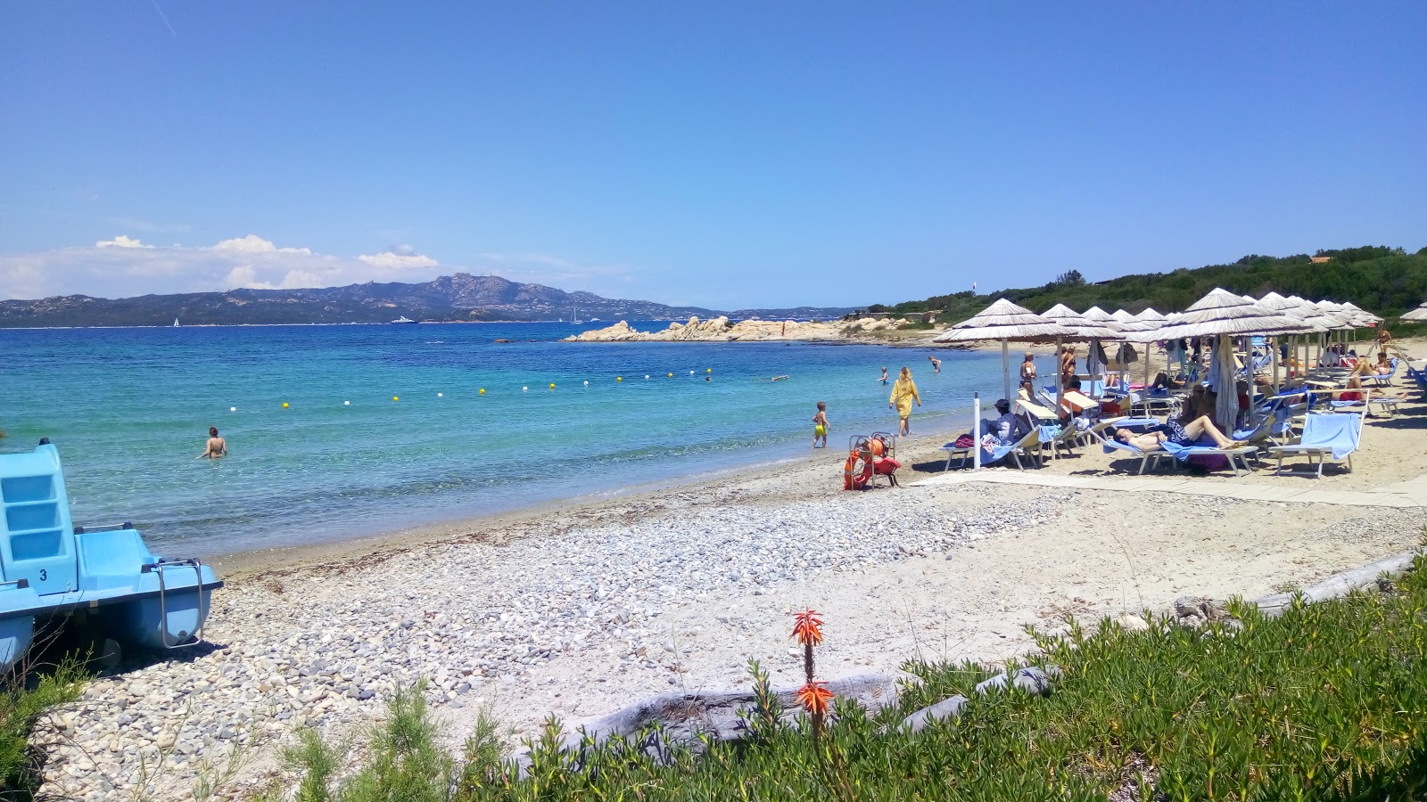 Valokuva Spiaggia dei Sassiista. pinnalla sininen vesi:n kanssa