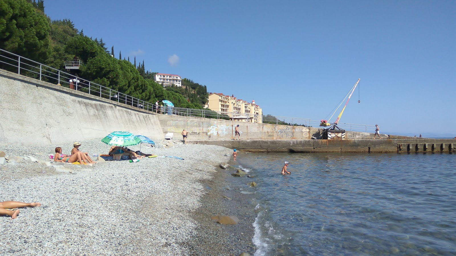 Foto de Beregovoy beach e o assentamento