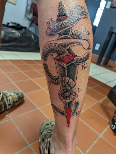 Explore dominant tattoo ideas, creative tattoo ideas in Titusville, available at Beatty Switchblade 347 Tattoo