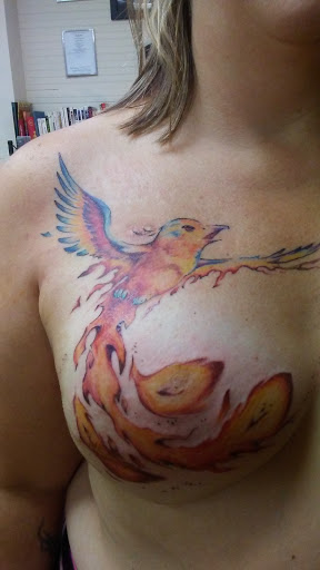 Tattoo Shop «Spectrum Ink Studio», reviews and photos, 5957 E Main St, Olcott, NY 14126, USA