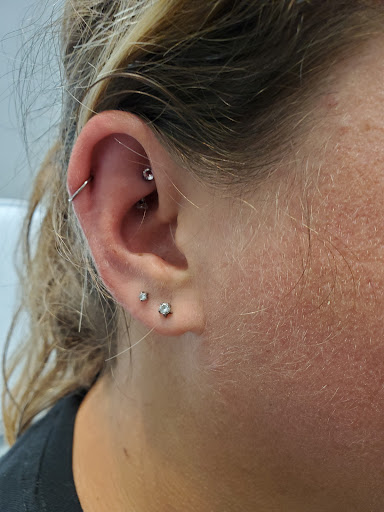 Explore rip neck tattoo ideas, creative tattoo ideas in Humboldt, available at BodyFx Piercing Studio Quality Jewelry Sales