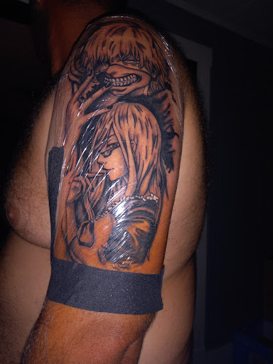 Explore ozzy tattoo ideas, creative tattoo ideas in Vincennes, available at Altered Image