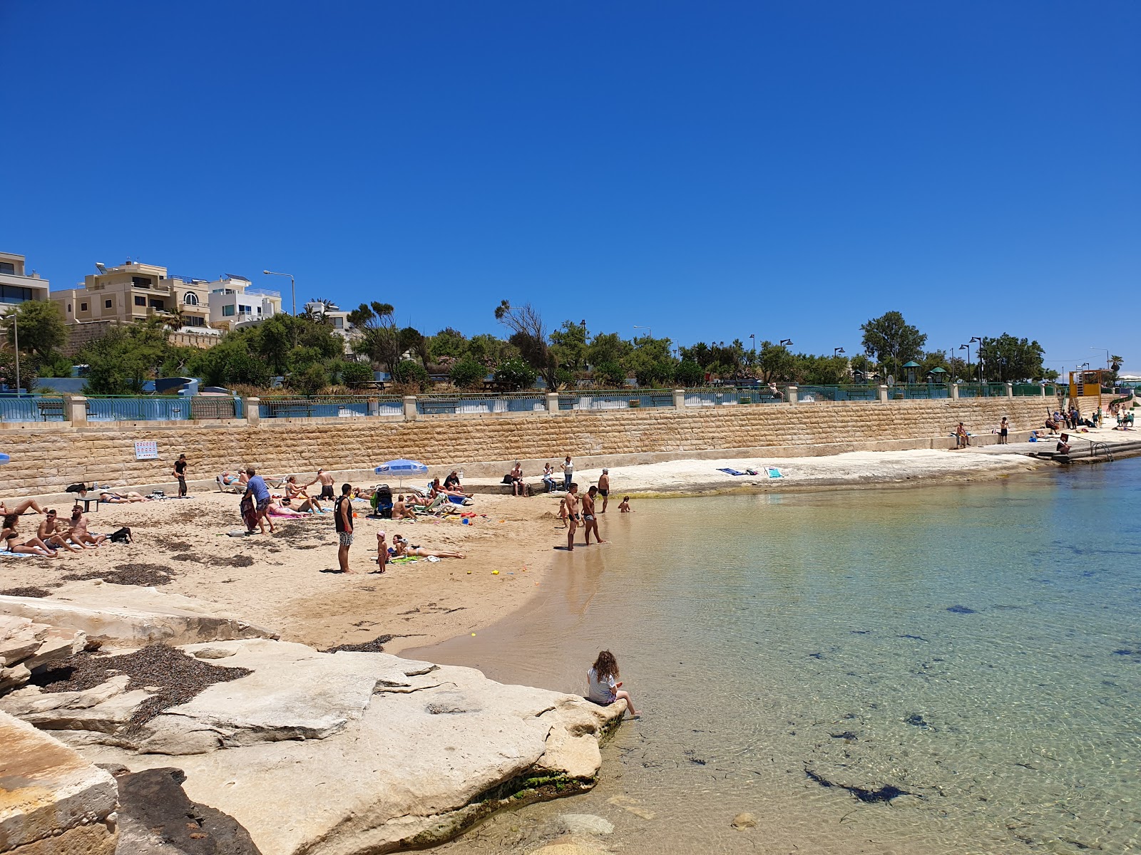 Fotografie cu St. Thomas Bay Sandy Beach cu golful spațios