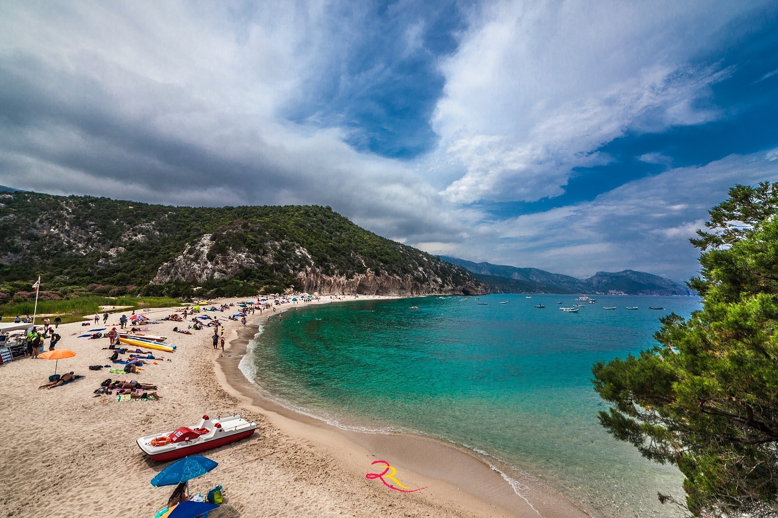 Photo of Cala Luna with light fine pebble surface