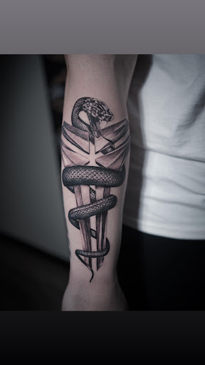 Explore wrist cross tattoo ideas, creative tattoo ideas in Tacoma, available at PRONOIA INK STUDIO