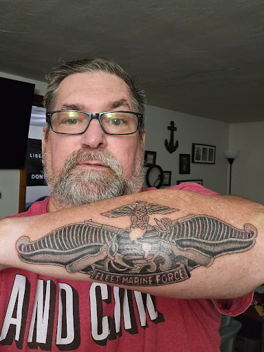 Explore angel forearm tattoo ideas, creative tattoo ideas in Englewood, available at Revolution Studios