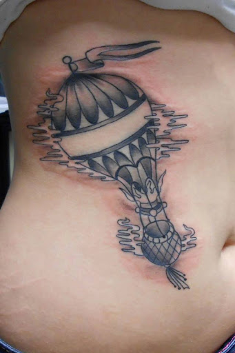 Explore back tattoo ideas for females, creative tattoo ideas in Erie, available at Wayward Tattoo Studio