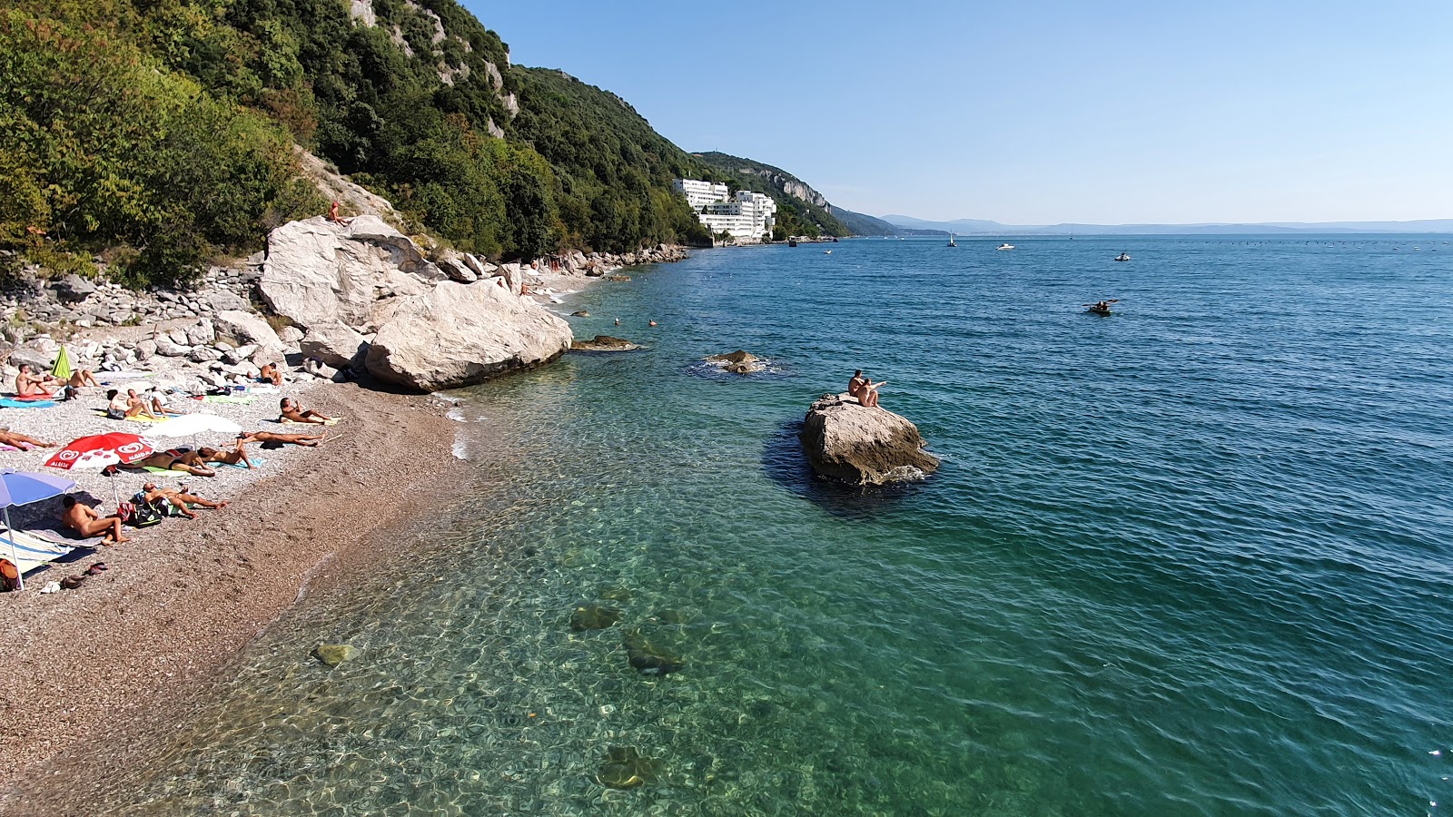 Costa dei Barbari'in fotoğrafı hafif çakıl yüzey ile