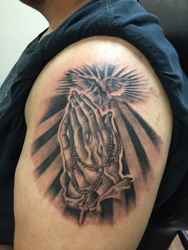 Explore motorbike tattoo ideas, creative tattoo ideas in Lakeland, available at Lyons Den Tattoo Company