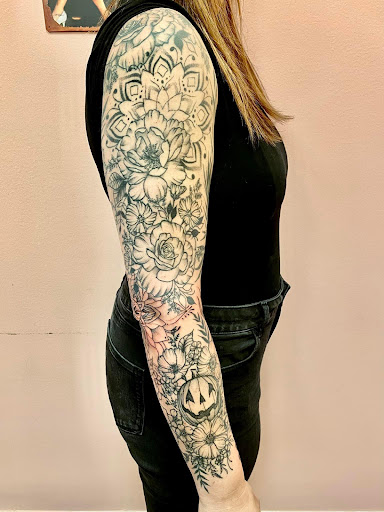 Explore feminine leg tattoo ideas, creative tattoo ideas in Batavia, available at The Pretty Pin-Up Tattoo Parlor