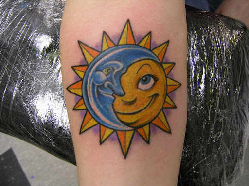 Explore hand tattoo ideas for men, creative tattoo ideas in Omaha, available at American Tattoo & Body Piercing