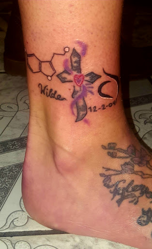 Explore dogwood tree tattoo ideas, creative tattoo ideas in Blackwood, available at Jersey Devil Tattooing & Body Piercing