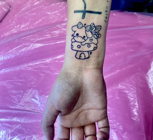 Explore donkey tattoo ideas, creative tattoo ideas in Lake City, available at Crooked Spines Tattoo Studio