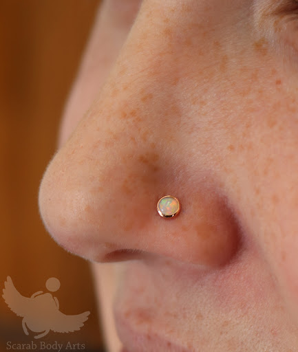 Explore cervical cancer tattoo ideas, creative tattoo ideas in Syracuse, available at Scarab Body Arts