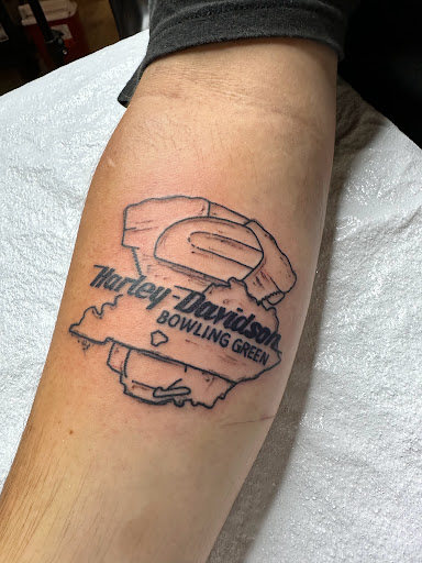 Explore zodiac tattoo ideas, creative tattoo ideas in Bowling Green, available at The Mad Tatter, L.L.C.