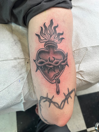 Explore tribal tattoo ideas for women, creative tattoo ideas in Worcester, available at Ideal Americana Tattoo Company