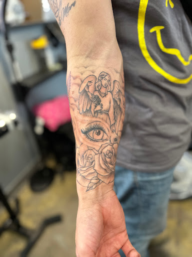 Explore mass effect tattoo ideas, creative tattoo ideas in Bloomington, available at Crimson Breed Tattoo Studio