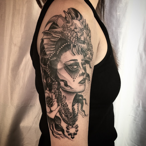 Explore cover up sleeve tattoo ideas, creative tattoo ideas in Fresno, available at Widows Walk Tattoo