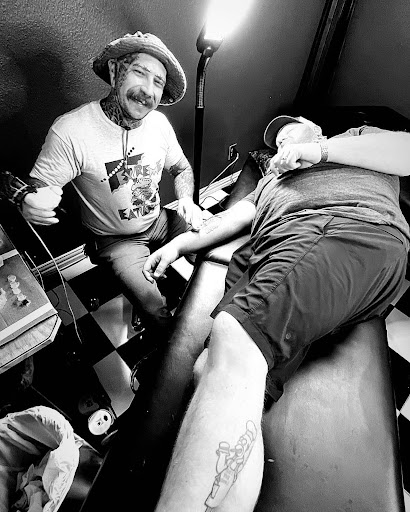 Explore dirtbike tattoo idea, creative tattoo ideas in Georgetown, available at Iron Rite Tattoo South