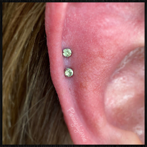 Explore dog print tattoo ideas, creative tattoo ideas in Fort Walton Beach, available at Piercings by Torrie