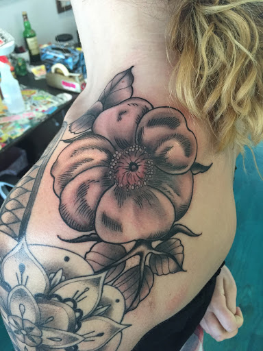 Explore tattoo for men idea, creative tattoo ideas in Reno, available at Aces Tattoo