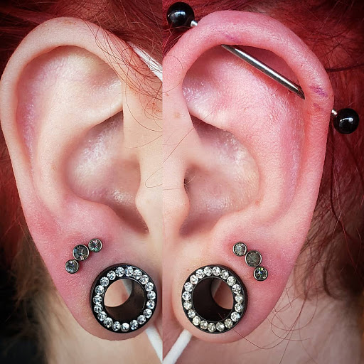 Explore blue flame tattoo ideas, creative tattoo ideas in Kokomo, available at Beatnik piercing & jewelry