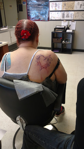 Explore tattoo ideas side stomach, creative tattoo ideas in Copperas Cove, available at Black Moon Tattoo Company