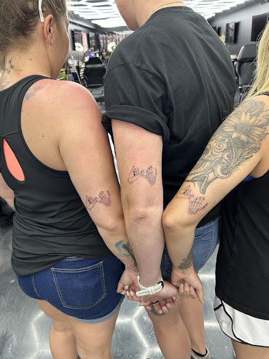 Explore tattoo ideas for grandchildren, creative tattoo ideas in Hollywood, available at Sacred Eye Tattoos